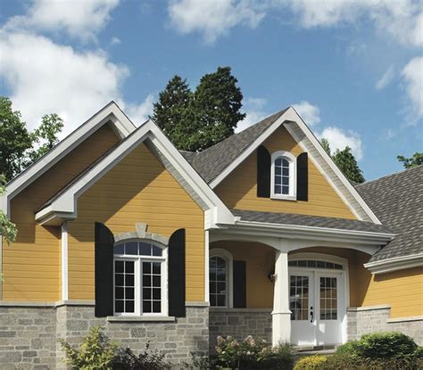 yellow house brown metal roof|exterior house colors brown roof.